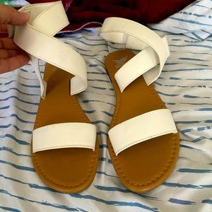Sandal with wrap around ankle